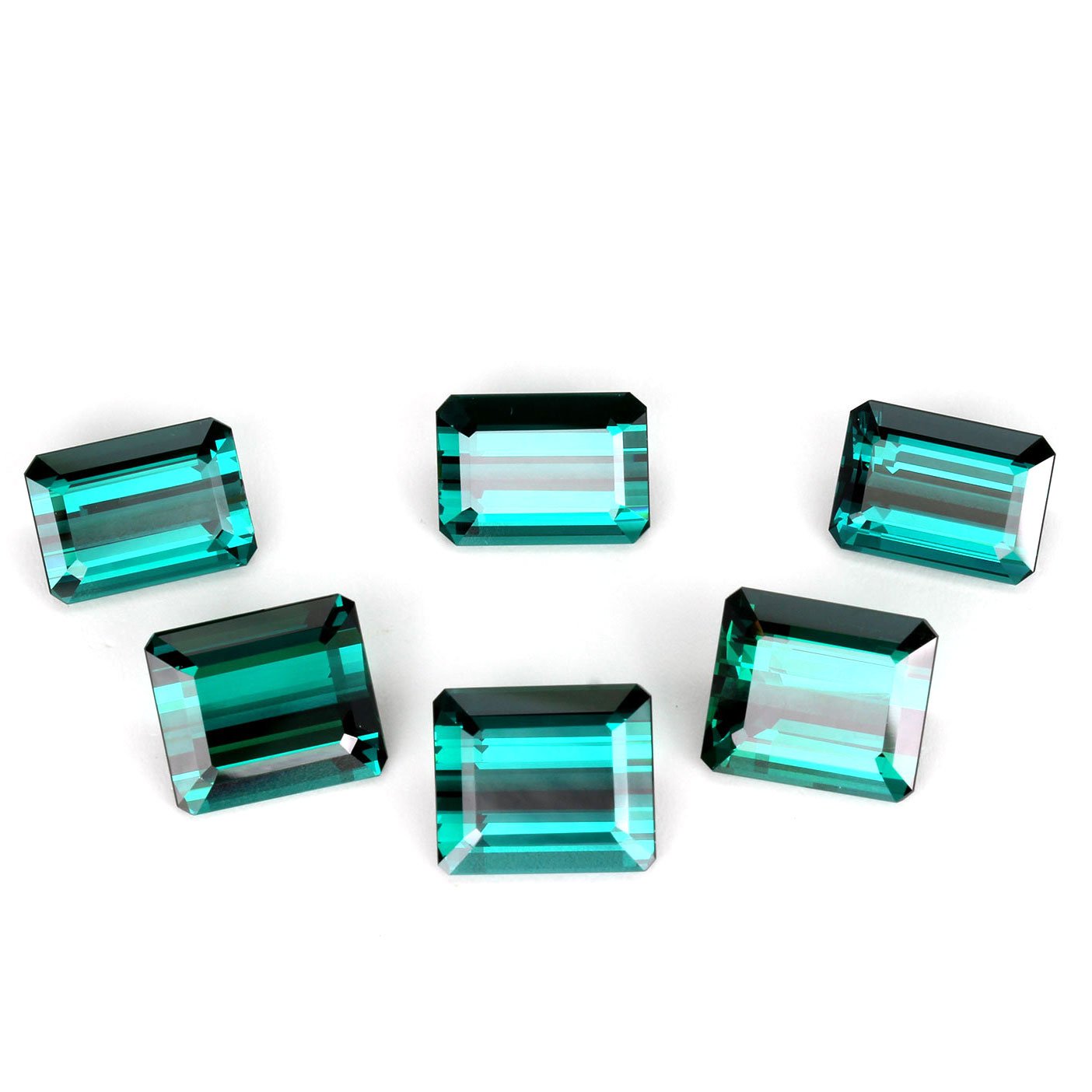 29.53ct Emerald Cut DB Color Indicolite Tourmaline Set
