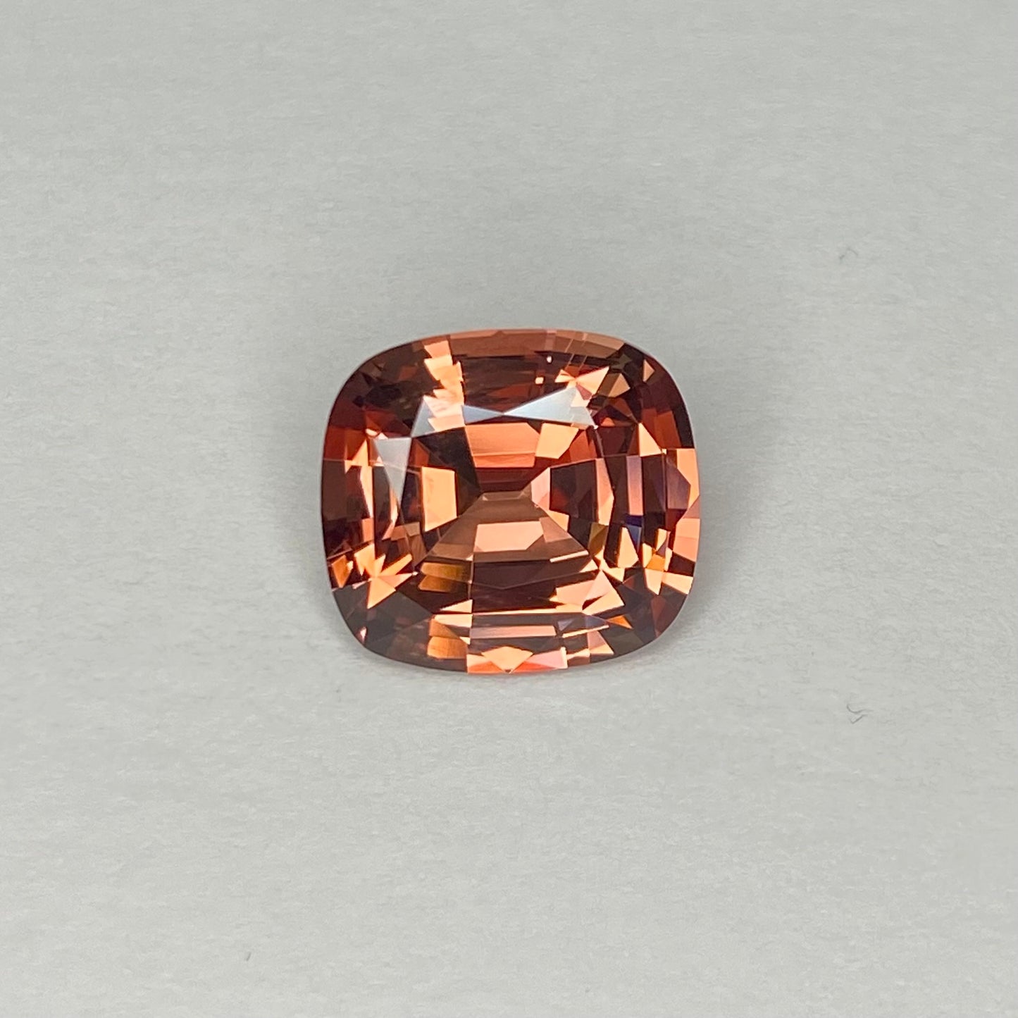 7.74ct Cushion Peach Malaya Garnet