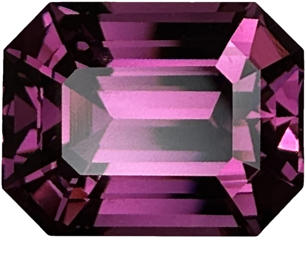 6.08ct Emerald Cut Magenta Rhodolite