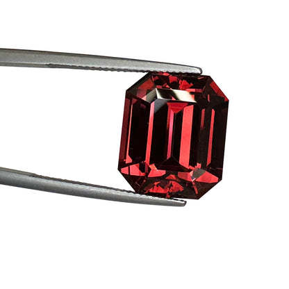 21.83ct Emerald Cut Deep Orange Malaya Garnet