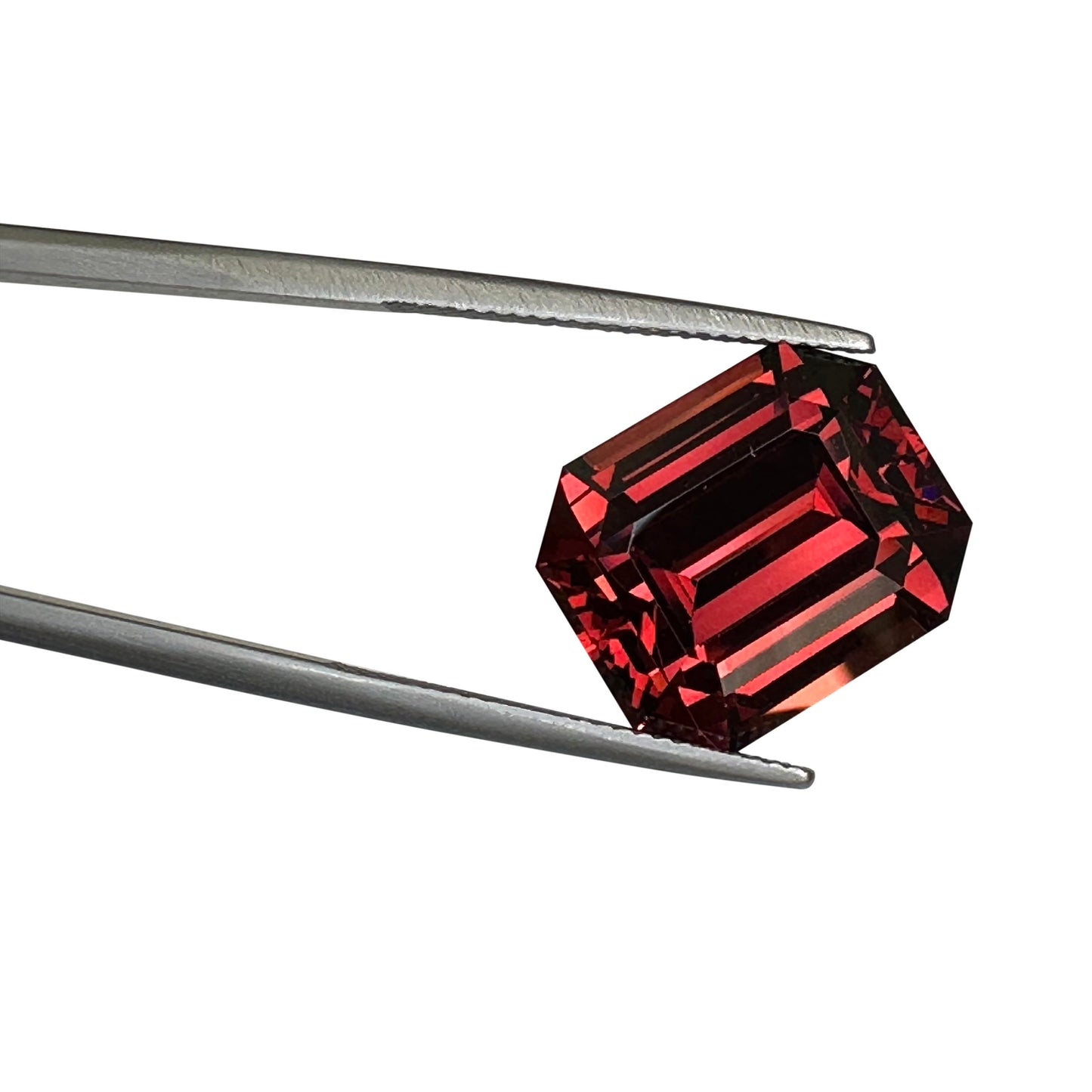 21.83ct Emerald Cut Deep Orange Malaya Garnet
