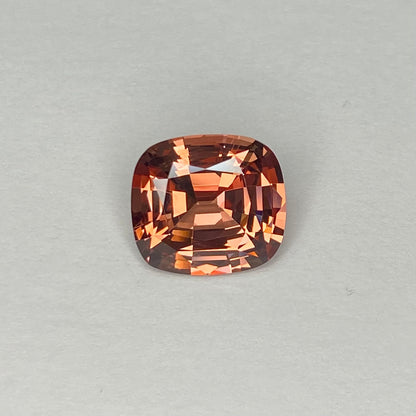 7.74ct Cushion Peach Malaya Garnet