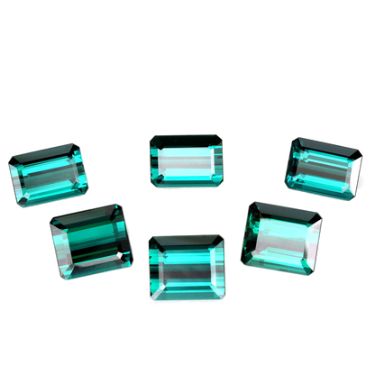 29.53ct Emerald Cut DB Color Indicolite Tourmaline Set