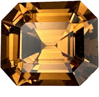 3.61ct Emerald Cut Medium Orange Malaya Garnet