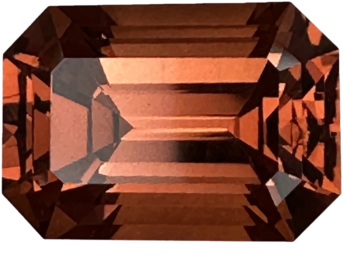 3.74ct Emerald Cut Medium Orange Malaya Garnet
