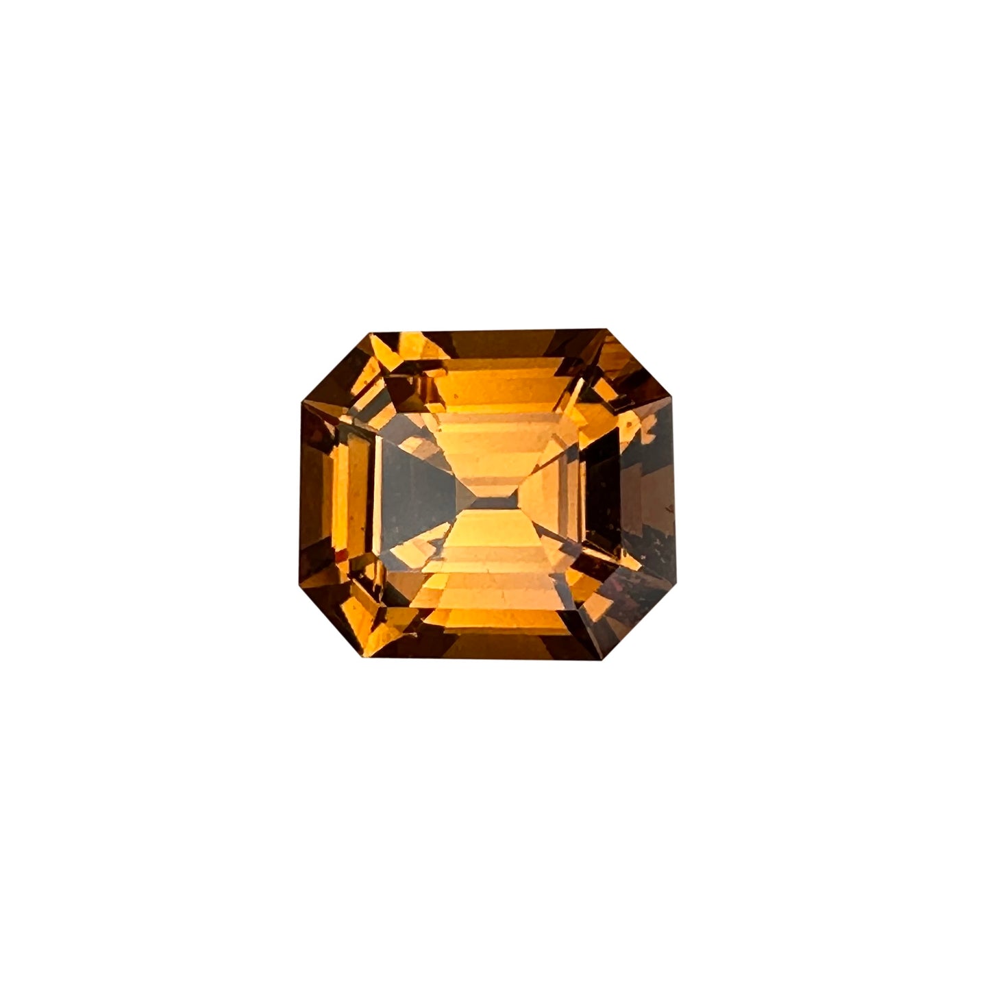 3.61ct Emerald Cut Medium Orange Malaya Garnet